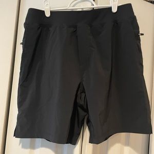 Fabletics men’s athletic shorts, black size large